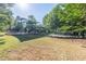 The community playground features multiple slides, climbing structures, and shaded areas for children to enjoy at 4507 N Peachtree Rd, Dunwoody, GA 30338
