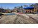 The community playground offers a variety of play structures, colorful surfaces, and safety features for all ages at 4507 N Peachtree Rd, Dunwoody, GA 30338