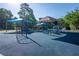 This modern community playground offers shaded play areas, climbing structures, and a safe, cushioned surface at 4507 N Peachtree Rd, Dunwoody, GA 30338