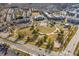Panoramic aerial of Suwanee Town Center featuring the green space, city hall, roadways and commercial buildings at 486 Raven Brook Ln, Suwanee, GA 30024