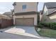 Spacious two-car garage with driveway and landscaping at 486 Raven Brook Ln, Suwanee, GA 30024