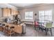 Convenient kitchenette with granite countertops, stainless steel appliances, and bar stool seating at 486 Raven Brook Ln, Suwanee, GA 30024