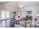 A bright and airy living room space featuring modern furniture and stylish decor at 486 Raven Brook Ln, Suwanee, GA 30024