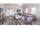 Spacious living room with seating area and natural light at 486 Raven Brook Ln, Suwanee, GA 30024