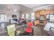 Open concept kitchenette and living space creating a great social area in the community at 486 Raven Brook Ln, Suwanee, GA 30024