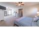 Large main bedroom with ceiling fans, ensuite bathroom, walk-in closet, and plenty of space at 486 Raven Brook Ln, Suwanee, GA 30024