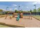 Fun community playground for , featuring swings and a slide in a safe environment at 486 Raven Brook Ln, Suwanee, GA 30024