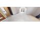 Bedroom with neutral carpet and two closets at 6948 Dalehollow Dr, Lithonia, GA 30058