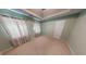 Bedroom with natural light and a standard door at 6948 Dalehollow Dr, Lithonia, GA 30058