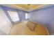 Bedroom with neutral carpet, light lavender walls, and a high trey ceiling at 6948 Dalehollow Dr, Lithonia, GA 30058