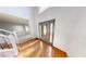 A bright foyer featuring hardwood floors, high ceilings, and an elegant front door at 6948 Dalehollow Dr, Lithonia, GA 30058