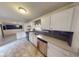 Bright kitchen featuring sleek countertops, and stainless steel appliances at 6948 Dalehollow Dr, Lithonia, GA 30058