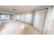 Spacious living room filled with natural light, neutral colors and modern finishes at 6948 Dalehollow Dr, Lithonia, GA 30058