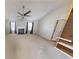 Living Room featuring a ceiling fan and a fireplace at 6948 Dalehollow Dr, Lithonia, GA 30058