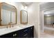 Elegant bathroom with double sinks, granite countertop, and modern fixtures, creating a spa-like experience at 1062 Meadow Grass Ln, Powder Springs, GA 30127