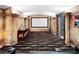 Fully equipped home theater with a large screen, comfortable seating, and custom finishes for an immersive experience at 1062 Meadow Grass Ln, Powder Springs, GA 30127