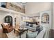 Living room with tall ceilings, view of the second story, and an open concept to the kitchen at 1062 Meadow Grass Ln, Powder Springs, GA 30127