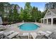 Community pool offers a refreshing escape with ample seating, perfect for relaxing and enjoying sunny days at 1062 Meadow Grass Ln, Powder Springs, GA 30127