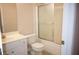 Bathroom includes sink, toilet, and shower at 1120 Lake Lucerne Rd, Lilburn, GA 30047