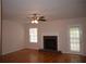 Bright living room with a brick fireplace and a door to the exterior at 1120 Lake Lucerne Rd, Lilburn, GA 30047