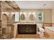 Stylish bathroom featuring a double vanity, a separate shower and bathtub, and tiled accents throughout at 2253 Creekstone Ct, Marietta, GA 30062