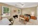 Bedroom features neutral paint, carpet, ceiling fan, and a window overlooking a wooded lot at 2253 Creekstone Ct, Marietta, GA 30062