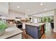 Spacious kitchen features large center island, modern appliances, white cabinets, and dark hardwood floors at 2253 Creekstone Ct, Marietta, GA 30062