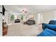 Spacious living room with a fireplace, large windows and plenty of room for relaxing and entertaining at 2253 Creekstone Ct, Marietta, GA 30062