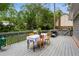 Outdoor deck with dining setup, offering an ideal space for alfresco meals at 230 Seamarsh Ct, Atlanta, GA 30328