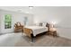 Inviting bedroom with natural light from two windows and neutral colored carpet at 230 Seamarsh Ct, Atlanta, GA 30328