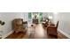 Spacious living room with hardwood floors and a cozy seating arrangement at 230 Seamarsh Ct, Atlanta, GA 30328
