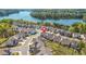Scenic aerial view showing the property located near a lake within a vibrant residential community at 351 Boundless Ln, Canton, GA 30114