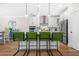 Contemporary kitchen with an island and sleek barstools, stainless steel appliances, and ample counter space at 351 Boundless Ln, Canton, GA 30114