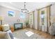 Well-lit living room showcases stylish furnishings, a decorative rug, and elegant window treatments enhancing the ambiance at 351 Boundless Ln, Canton, GA 30114