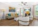 Bright living room featuring a fireplace, modern furnishings, and large windows providing natural light at 351 Boundless Ln, Canton, GA 30114