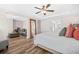 Large main bedroom with an ensuite living space, wood floors and a ceiling fan at 351 Boundless Ln, Canton, GA 30114