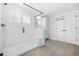 Contemporary shower with a glass surround, a built-in bench, and white subway tile at 351 Boundless Ln, Canton, GA 30114