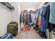 Spacious walk-in closet with shelving and plenty of storage space for clothes and accessories at 351 Boundless Ln, Canton, GA 30114