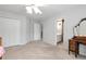 Bedroom with double closets, en-suite bath, and neutral walls and carpet at 5309 Davenport Mnr, Cumming, GA 30041