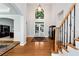 Gracious foyer with high ceilings, hardwood floors, and a grand staircase at 5309 Davenport Mnr, Cumming, GA 30041