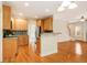 Spacious kitchen featuring wooden cabinetry, granite countertops, and an open layout at 650 Virginia Highlands, Fayetteville, GA 30215