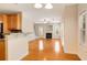 Open-concept living room features hardwood floors, a fireplace, and plenty of natural light from large windows at 650 Virginia Highlands, Fayetteville, GA 30215