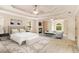 Spacious main bedroom boasts a fireplace, sitting area, tray ceilings, and ample natural light at 650 Virginia Highlands, Fayetteville, GA 30215