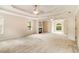 Spacious primary bedroom with tray ceiling, fireplace, and natural light at 650 Virginia Highlands, Fayetteville, GA 30215