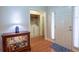 Inviting entryway with hardwood floors leads to laundry room for added convenience at 152 Cooper Creek Dr, Dallas, GA 30157