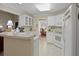 Bright kitchen featuring white appliances and ample counter space, perfect for cooking at 152 Cooper Creek Dr, Dallas, GA 30157