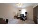 Bedroom featuring a desk, chair, and a closet at 387 Cascade Sw Dr, Lilburn, GA 30047