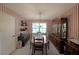 Traditional dining room featuring a vintage chandelier and classic wood furniture at 387 Cascade Sw Dr, Lilburn, GA 30047