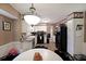 The kitchen features updated appliances, modern lighting, and a fun decor, ready for gourmet meals at 387 Cascade Sw Dr, Lilburn, GA 30047