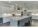 Spacious kitchen with island and stainless steel appliances, great for entertaining at 500 S Hill St, Buford, GA 30518